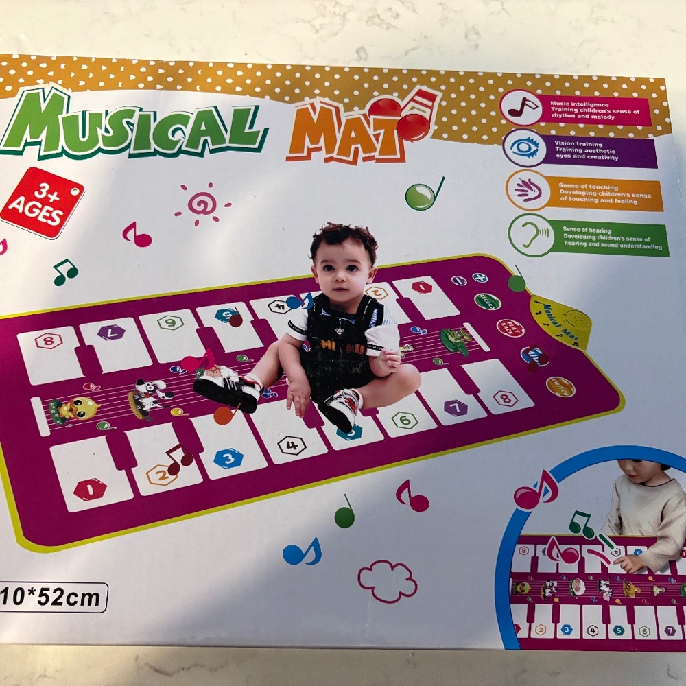 SOLD—Brand new Musical Mat